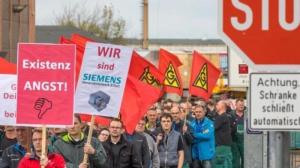 744656 1 teaserlarge siemens mitarbeiter beim protestmarsch foto arifoto ug michael reichel dpa archiv 65c5fde0ebb17bca