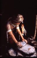 arch Madchen beim Getreide mahlen in einem jungsteinzeitlichen Dorf ca 5000 v Chr cMuseum Urgeschichte Zug print 2